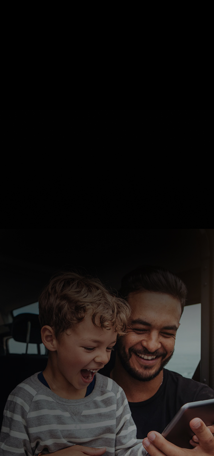 Digital experience agency employees collaborating on computer at desk.